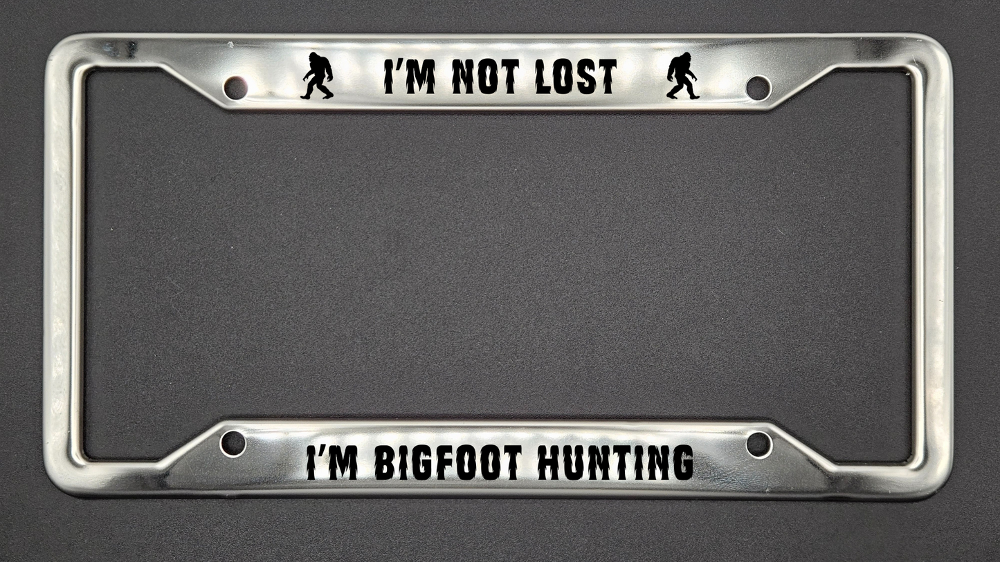 Not Lost Bigfoot Hunting - Stainless Steel License Plate Frame - Bigfoot Bigheart Studio