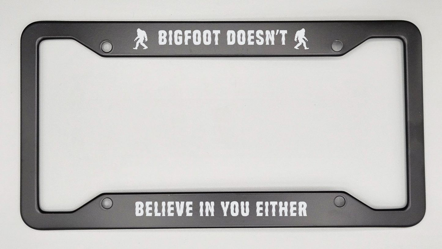 Bigfoot Doesn't Believe In You Either - Metal License Plate Frame